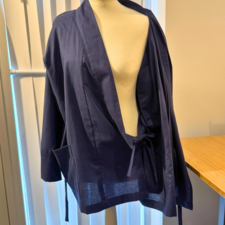 Chore Jacket Sewing Pattern displayed on a mannequin, showcasing a stylish unisex Samue jacket design in navy blue.