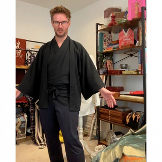 Men’s Kimono Sewing Pattern black haori jacket worn by a model, showcasing a stylish and authentic design.