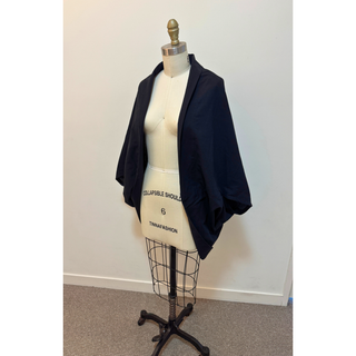 Cape Jacket Sewing Pattern displayed on a dress form, showcasing its stylish and versatile design.