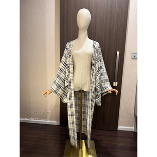 Kimono Sewing Pattern Set displayed on a mannequin featuring a stylish plaid design kimono.
