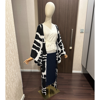 Kimono Sewing Pattern Set displayed on a mannequin showcasing a stylish black and white kimono with a modern design.