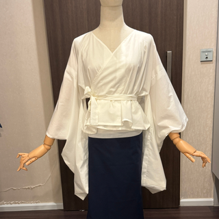 Kimono Wrap Top Sewing Pattern showcased on a mannequin, featuring wide kimono sleeves and adjustable wrap design.