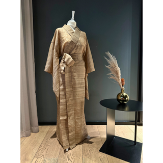 Haori Yukata & Kimono Sewing Pattern displayed on a mannequin with a vase and decorative plant in the background.